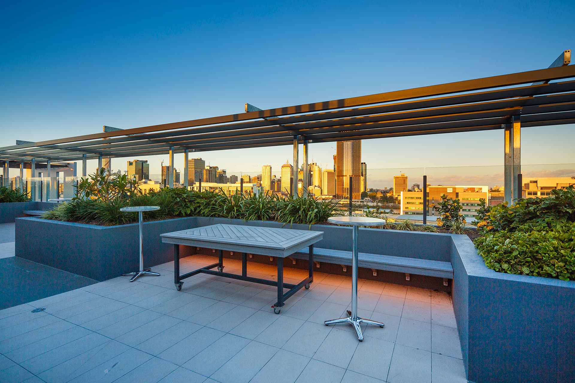 Students socializing on rooftop terrace