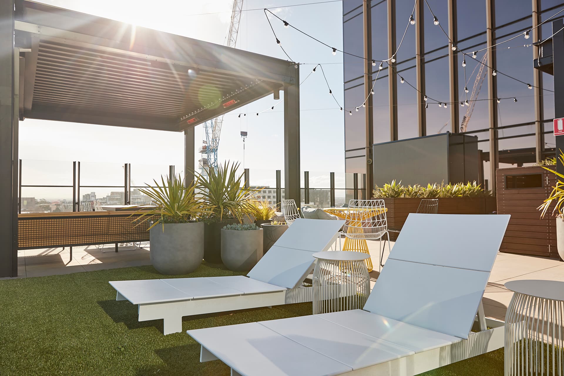 Students socializing on rooftop terrace